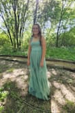 My daughter wore this to prom, and it fit her style and personality perfectly. The built in bra was comfortable and supportive, and it was very well made and not itchy. Overall, she was very happy with it, and the length was great to cover her walking boot (from an ankle injury). - Erin W.