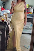 I bought this dress for my cousin's upcoming wedding. I was concerned that it would be sheer considering the light color and having several tattoos, but it is lined! The lining is thin and you can still see my tattoos if looking closely or in direct sunlight. The material is lightweight and matches the color of the photo exactly. The fit is snug, and if in between sizes, I would recommend sizing up for comfort. I would say that it is not exactly a good fit to wear to a wedding, but I am keeping it for future gala events. 10/10 love! - Sara G.