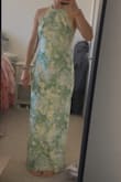 I initially ordered a M, but it was too big. The small fits me well. Material is nice and I love the color. Decided to return because I liked other dresses better - Pietra S.