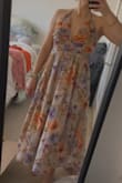 Medium was too big but small fit well. I am between sizes. Fabric was really pretty. Decided to return because I liked other dresses better and didn't love the neckline on me - Pietra S.