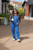 I'm not sure how tall the model is and it is a different style. My overalls were a wider bottom, and I also had to cuff them because they were too long. I do like them though. - Daysi G.