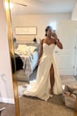 I did not end up buying this dress, but it was my favorite out of all the wedding dresses I tried on. I ended up going with another dress (from Lulus), which fit the vibe of our wedding reception more. I don't think many people realize how GREAT Lulu's wedding dresses are! I will never not spreading the word! This dress is BEAUTIFUL, amazing quality, the slit is perfection! And literally a fraction of the cost bridal boutiques charge! I am VERY impressed!! - Deepali A.