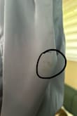 Beautiful Dress! Exactly as pictured!

However, mine came with a darkened/sticky spot on that top/back of the dress- which could be removed with soap. A little sad about this ): - Mackenzie G.