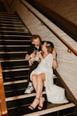 I ordered this dress for my wedding (along with a couple of others) & as soon as I put this one on, I knew it was the one! I did have to have it altered to fit a little better. It was too long on me (I'm 5'3) and the top was a little big, but other than that, it was perfect! I loved the slit in the leg (it made for some fun, sexy photos) & the fact that I didn't have to wear a bra! Plus, the loose fit around the stomach was flattering, and I was able to enjoy my wedding meal (pasta!) without worrying about looking bloated! It was classy yet had a little bit of sex appeal with the deep V and open back! I HIGHLY recommend this dress!! - Marissa M.