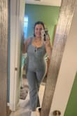This fits snuggly, but the denim does have some stretch. The only part I do not like on myself is the belly area, which I will most likely get some spanx for. Other than that, it fits very well, and the denim having a little stretch is an added bonus. - Hayley O.