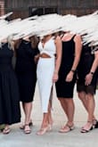Wore this for my bach party. Wore with a bra, but could have worn without. The fit was perfect. The material is dreamy soft. Likely will get in another color. - Jacque T.
