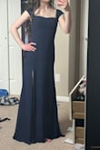 I absolutely loved this dress! It fit perfect and was just the right length. The only thing I didn't like was the slit was a little too high on me so I did bring it down slightly, but other than that, it was perfect. The quality was very good too! - Rebecca H.