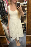 This dress looked much cuter in person. The fabric was thick and nice quality. My only complaint is the straps are not adjustable. - Megan K.