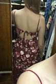 The embroidery on this dress is gorgeous. The red is much brighter in the daylight. The dress is fairly structured so it might not work for everyone, but was great for my proportions. My only complaint is the fabric in the back gaps at the bottom. - Megan K.