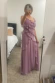 The dress is beautiful and fits perfectly. Very comfortable and flowy. Received many compliments on it. The color is amazing - Mari P.