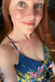 I did pin the top securely, since I'm not used to going without a bra, and I think it helped a lot. This dress is ABSOLUTELY STUNNING in person, and I was so glad I picked it. The blue is more vibrant in person than it looks in the photos, and I felt it was perfect with my red hair/blue eyes--everything just popped in the right ways.

The only negative I found: length was a little long on my height, even though I had tightened the straps quite a bit, and the skirt is so voluminous, that people were stepping on the skirt unless I gathered and held it. I don't like high-high heels myself, and I'm sure this is solved for most people by wearing taller heels! - Kayte H.