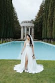 I went to a bridal shop and tried on a bunch of $1-2k dresses and then ordered a few dresses from Lulus and other online shops to try. This one fit so well, and the material felt great. I loved the timeless satin look and the leg slit! Our elopement photographer was so surprised it's only $300. "You look expensive" haha - Haoxing D.