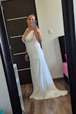 It's the perfect dress for a simple wedding. The neckline is deep, and the fabric is very high quality. - Alejandra M.