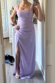This dress didn't fit my petite frame very well. It was way too long. Even with 4" heels on I would have needed to hem at least 2-3" to make sure it didn't drag the ground. The torso was too long, and I would have needed to shorten the straps by at least half an inch, if not more, to make sure they stayed up. The zipper was difficult as well. The material was good! - Katie T.