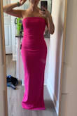I absolutely love this dress! The material is amazing, the fit is perfect for my body (except the length.) I wish there were a petite version! Even with 4" heels I still need to hem the dress 2-3" to ensure it doesn't drag the ground. The color is beautiful! I love the grippy/sticky material on the top of the dress that helps it stay in place. - Katie T.