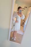 Bought this for my bridal shower and absolutely love it! Exactly the vibe I was going for! Due to the low back, the sleeves do tend to fall, but I just got a double sided tape and they don't budge using that! - Ally G.