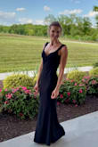 Fits true to size, love the open back. Worked well just with sticky bra cups. - Amy O.