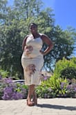 Absolutely love this gorgeous dress. The back falls perfectly that it's not too revealing. The pivot reason I gave 4 stars is Brevard because the straps didn't stay tight and I had to adjust a few times. - Meikisha D.