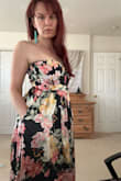 This dress fits true to size IM0- beautiful and flowy. Love the tie at the back, I'm big on bows. The front of the dress wasn't very supportive, so my chest was kind of squished down, but I didn't mind because of how beautiful this dress was! Can't wait to wear it again..bought it for my 40th :) - Rachel D.
