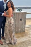 Since I opened the bag of my order, I was stunned by this dress! Everything about the dress was exactly as I imagined. The fit was very adjustable due to the back straps, it also has a zipper with a clip that ends in your waist. So many people during the wedding came to me and asked me where I got it and also to say it looked beautiful on me. - Maria M.