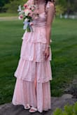 My daughter really loved this dress for her senior prom. It fit well and was comfortable. She liked that it had a slit and was easy to move around in and not right fitting all the way to the floor. - Sarah E.