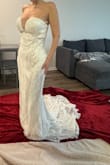 It was beautiful, but definitely get your true size. The reviews said it runs small, but it does not. I am usually a size small-medium. I got a medium and it was HUGE. I just re-ordered in small. It is absolutely stunning, though! - Joana F.