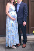 The color and pattern were very pretty and it didn't make me feel huge when I wore in my third trimester. As other reviews noted there are only a couple thin ties that hold this dress together so I was a little nervous. I used plenty of fashion tape and had no issues with attending dinner. I wouldn't recommend dancing in this dress since there's not much support. - Meesha L.