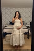 A reviewer said the dress makes you look pregnant. Which sold this dress to me. I'm in my second trimester of pregnancy and this dress is so cute, so I might wear it for my baby shower. - Mai M.