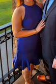 This dress was the perfect fit and I just adored the color.  Was a great option for a party I was invited to attend. However, the buttons at the neckline were terrible. I had to get my husband to button them for me, which was a production since the buttons are so teeny.  At the end of the evening, I asked him to help me unbutton them and he struggled again.  One button popped off and now I need to sew it back on after just one wear!  Not ideal. - Randi S.
