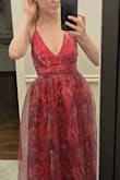 I fell in love with this dress online and was so excited to receive it in the mail, but it was pretty disappointing when I put it on. I read the reviews that said it fit smaller than usual, but I am pretty petite in the chest and torso, so I figured I should go with a small. I could get it on and zip it up, but it's uncomfortably right on the rib cage because there's no stretch whatsoever. That would be fine, but the double layer of fabric looks a bit strange on my chest, and adds a lot of bulk to the hip area because of where it sits on the hip. I will be returning the dress and looking for another, but it looks so gorgeous on everyone else whose left photo reviews! - Jackie O.
