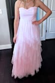 This dress exceeded our expectations, my daughter loved it. So beautiful, especially the ruffles on the skirt. - Amber L.