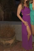 I love a good jump suit and this two piece set was perfect for a bachelorette party in New Orleans! My only complaint is that I could not order a different size top and bottom. I ordered a small and had to have the waist taken in. The top fit perfectly bc it's adjustable. Once I had the waist altered the length was perfect with wedges. - Jenna M.