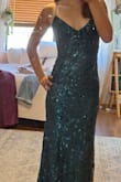 I was really excited about this dress, but unfortunately, it was too low for me to be comfortable in. The back was really pretty. Honestly, it looks a lot better on the model than in person. This dress just wasn't for me. - Reagan T.