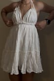 I ordered this dress to try for graduation, and as much as I love the beachy vibe, it was too baggy on me. The dress itself doesn't have a lot of shape, and there is a lot of very thick material. I adore the neckline, but I wish that the waist of the dress went a little bit lower to give it more shape. Otherwise, it was super comfy! This dress fits more of a brunch scene or beach vacation. - Sierra R.