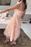 Great material and fits well overall except the chest was a bit loose. Pink color is a darker shade of pink compared to picture. Overall very cute. Bought size S - Ursula A.