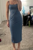 It's really cute and fit well. I agree with other reviews that the zipper bunches up a little weird but it wasn't a huge deal. I ordered a medium, and I'm usually between a medium and a small. It fit perfect on me. I loved the color. The material is also double-lined so it has a smoothing effect I liked - Katlyn N.