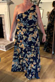 I love the light material; the fit was fantastic and flattering for a bigger chest lady. It's a beautiful dress! - Amanda D.