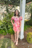 The fabric is lovely and the dress is very well-made. Sleeves can be worn on or off the shoulders. My daughter loved the dress and got many compliments on it all evening. - Monica T.