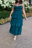Absolutely loved this dress! It was so much fun with the different layers! I did end up sizing down only because it was a little loose in the waist area and if a dress is only tight on the top, I'm always between a S/M for sizing - Melissa D.