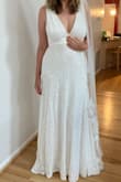 I love this dress! It is Light, comfortable, and pretty. I will close the V-neck a little because the cleavage is a bit much, but that should be simple enough. - Leonie J.