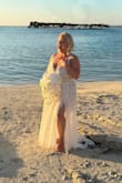 This dress is perfection! I felt so beautiful wearing it for my Vow Renewal in Jamaica. We celebrated our 30th wedding anniversary. You will not regret this purchase. Amazing Quality. - Helene P.