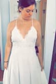 I'm getting married outdoors at the end of June this year, and I wanted to find a lightweight, summery dress that would keep me comfortable throughout the heat of the day. Every "wedding" dress I have found thus far has had 423984 layers of fabric and has been too heavy to stand in any longer than a half hour, but I wanted a dress I could wear all day. So I decided to look elsewhere for dresses that aren't necessarily classified as "wedding gowns" but still have enough elegance and detail on them to pass as bridal. Lulu's has so many that suited my style and vision, so I ordered a few others along with this one to try on, but this one is THE one! It's so comfortable and fits in all the right places, true to size! I'm usually an 8-10, so was expecting the Large to be a little big, as the size chart says 10-12. But it's perfect! I'm so excited to wear it all day for my wedding. It will need to be altered a little as it's pretty long and I plan to wear flats, but at this price, are you kidding?! No-brainer! - Hilary F.