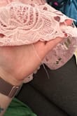 I absolutely love this dress, but looking at it, there are some threads at the bottom hanging off and stains. I have the wedding today that I am attending and just have to pray no one sees the stains - Rebecca T.