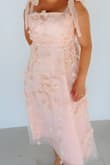 The dress is so carefully put together, granting the lightness of petals that we expect from a dress like this. Got many compliments and stood out. - Luana P.