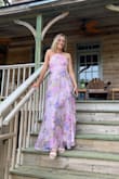 I wore this to a rehearsal dinner, and I felt beautiful in it! The length was great, especially as I'm a bit taller and wore heels. The halter top fit nice and snug, where I was comfortable not wearing a bra, which was great. The double lining make the dress feel high quality. Would 100% recommend! - Brigitte L.
