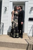 I bought this dress to wear as a wedding guest for a spring wedding. It arrived long, which was expected, based on other reviews. I had it hemmed about 1.5 inches. My tailor also added small breast cups in the top portion. This was helpful because most bras would not work with this dress. I have a very small chest, and this was all I needed. The straps adjust to fit, and the leg slit was perfect for keeping cool and walking around was a breeze. The flower pattern was gorgeous and I would recommend this for any spring/summer event. - Keris G.