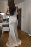 The material is very thick, not cheap at all! Surprised for how much the price is, I love that even though it's thick, it's very stretchy and comfortable. It hugs your body well. Length is too long for me, but that can easily be altered. - Carol Y.