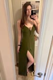 It fits a little snug around the rib cage, but I think a Large would've been too big. I'm typically a size 8 or Medium across the board. I love the green color, and it feels comfortable with no bra. Length could be a little longer, but it works with flats (I'm really tall). - Mary H.