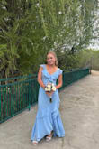 I thought the dress was great! Good quality, good arrival time, good fit. I'm shorter than the model, so it did hit longer, but my 3 inch heels made it the perfect length. It even rained during my pictures and the dress was not ruined because of it. - Jessica M.