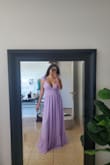 This dress is absolutely gorgeous! I have a quinceañera to attend this weekend, and I couldn't be happier with how this dress turned out. I'm obsessed with the ruffle details on the shoulder, such a beautiful touch! I am having the bottom hemmed slightly (as expected, since I'm on the shorter side), and I'll also be adjusting the V-neck to make it a bit less deep. Overall, I'm in love with this dress and can't wait to wear it! - Deanna F.